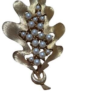 Vintage gold tone leaf and faux pearl brooch signed J.J.